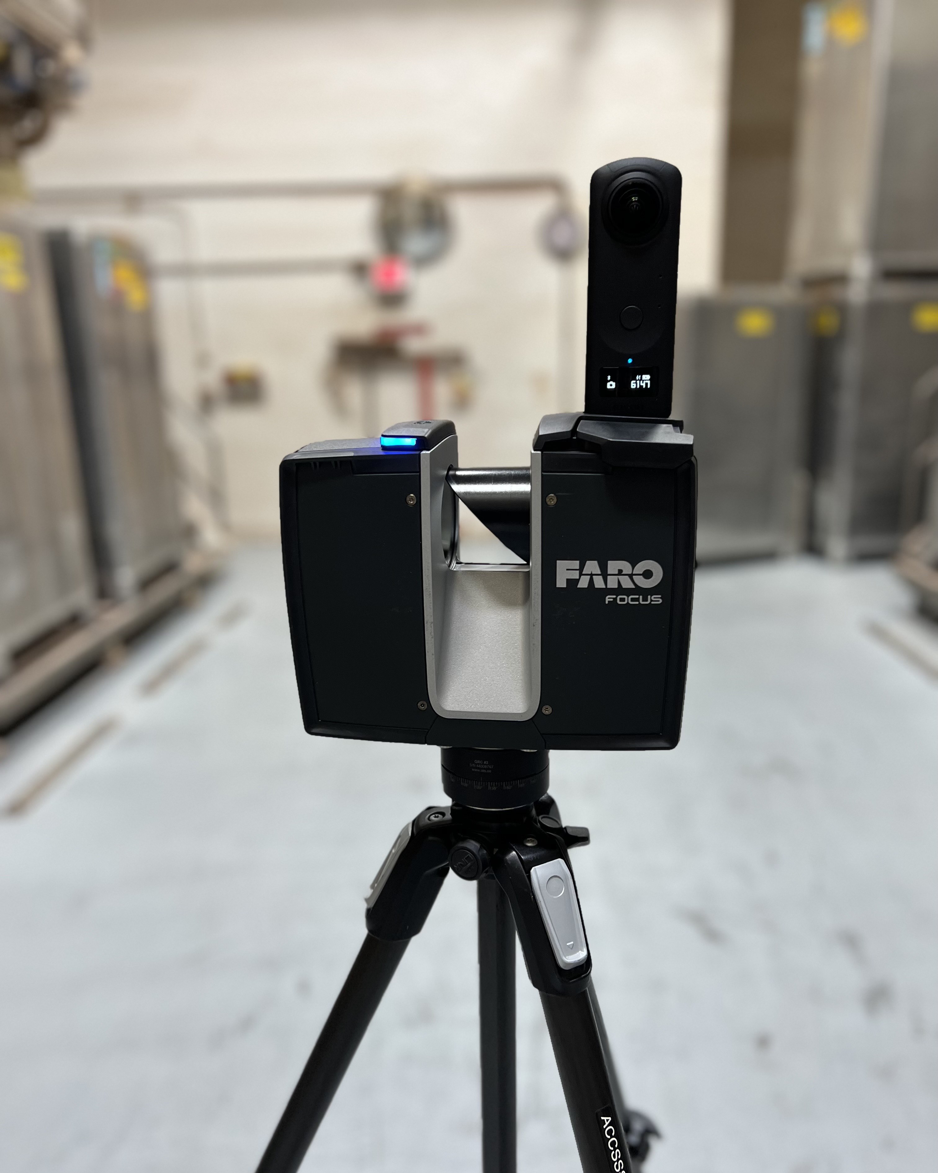 FARO Focus 3D laser scanner on tripod in a mechanical room